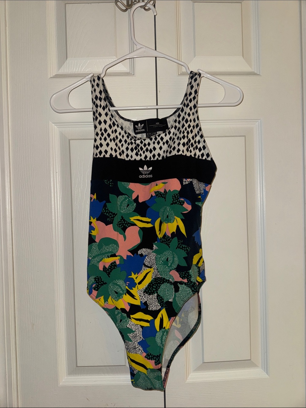 adidas x HER One-Piece Bodysuit in Black with Multi-Color Floral Print